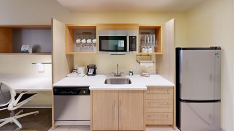 Desk, laptop workspace, blackout drapes, iron/ironing board