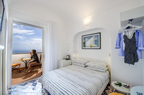 Superior Double Room, 1 Queen Bed, Balcony, Sea View | Premium bedding, down comforters, memory foam beds, minibar