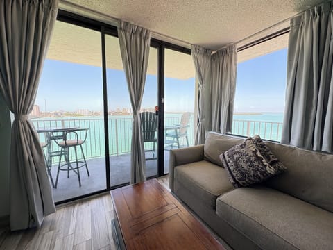 One Bedroom Apartment, Gulf View 603 | Living area | TV