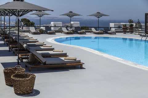 Seasonal outdoor pool, open 11:00 AM to 8:00 PM, free cabanas