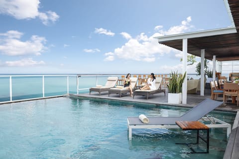 Outdoor pool, pool umbrellas, sun loungers