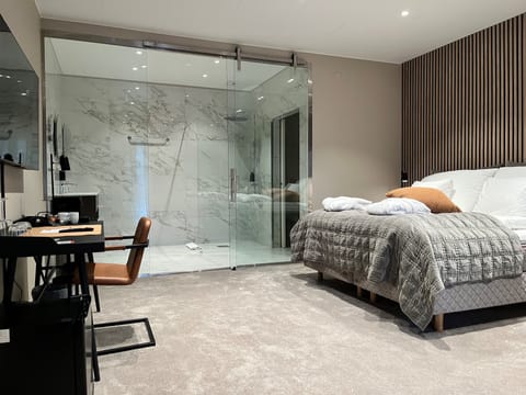 Design Studio Suite | Individually decorated, individually furnished, desk, blackout drapes