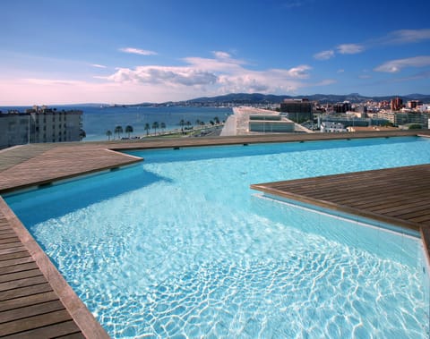 Outdoor pool, open 10:30 AM to 6:30 PM, pool umbrellas, sun loungers