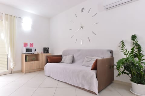 Apartment, Ground Floor | Living area | Flat-screen TV