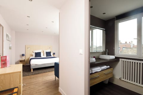 Family Room | Premium bedding, desk, blackout drapes, soundproofing