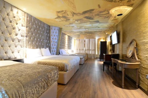 Luxury Room, Jetted Tub (sleeps 6) | Premium bedding, minibar, in-room safe, individually decorated