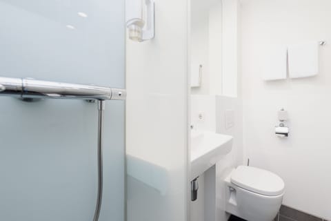 Shower, eco-friendly toiletries, towels, soap