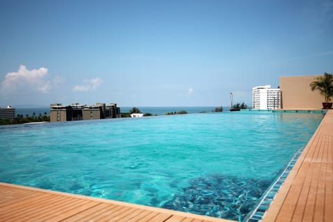 Outdoor pool, open 7:00 AM to 7:00 PM, sun loungers