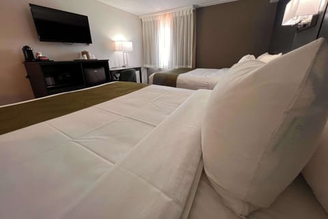 Desk, laptop workspace, iron/ironing board, cribs/infant beds