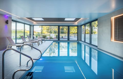 Indoor pool, open 7:30 AM to 10:00 PM, sun loungers