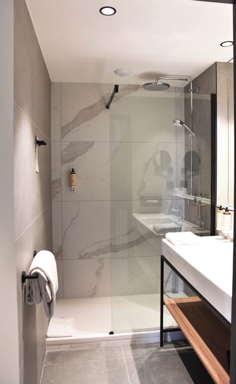 Eco-friendly toiletries, hair dryer, towels, soap