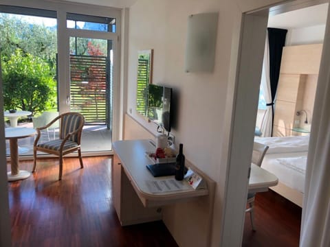 Family Suite | Minibar, in-room safe, desk, laptop workspace