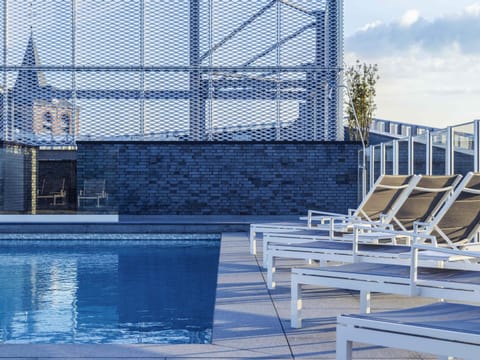 Seasonal outdoor pool, open 9:00 AM to 8:00 PM, sun loungers