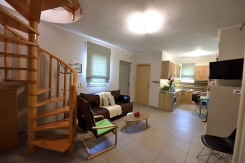 Family Duplex | Living area | Flat-screen TV, fireplace