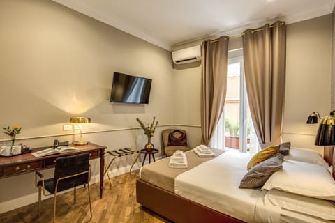 Premium bedding, down comforters, minibar, in-room safe