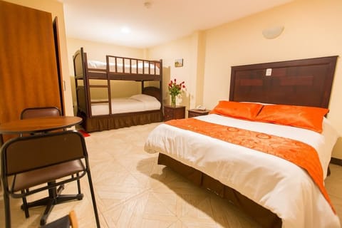 Family Triple Room | Minibar, desk, laptop workspace, iron/ironing board (on request)