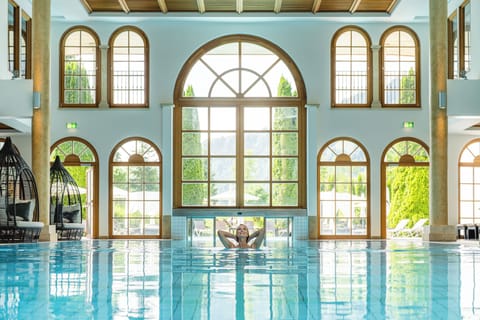 Indoor pool, outdoor pool, pool umbrellas, sun loungers