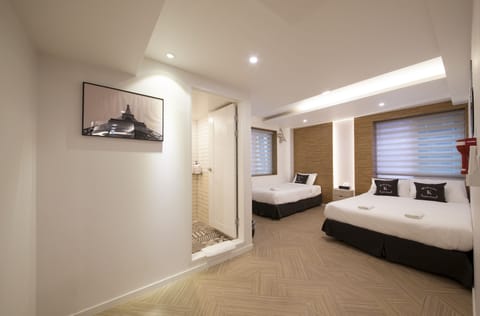 Triple Room | Individually decorated, blackout drapes, rollaway beds, free WiFi