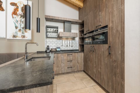 4-bedroom penthouse with private sauna | Private kitchen | Espresso maker, coffee/tea maker, electric kettle, highchair