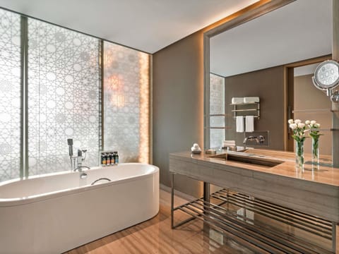 Premium bedding, free minibar items, in-room safe, desk