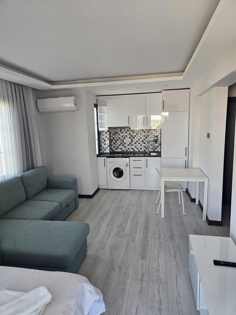 Family Apartment | Living area | 32-inch LCD TV with satellite channels, TV