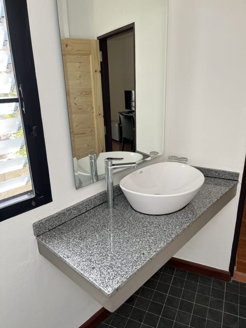 AC Premiere | Bathroom | Free toiletries, towels