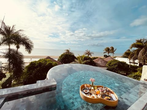 Outdoor pool, pool umbrellas, sun loungers