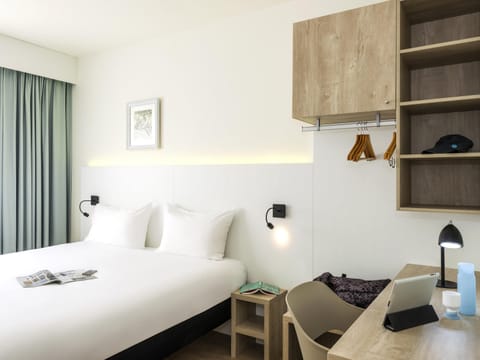 Desk, blackout drapes, soundproofing, iron/ironing board