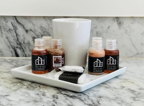 Deluxe Suite, Jetted Tub | Bathroom | Shower, designer toiletries, hair dryer, towels