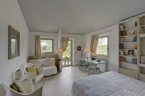 Deluxe Quadruple Room, 1 King Bed, Garden View | Premium bedding, down comforters, minibar, in-room safe