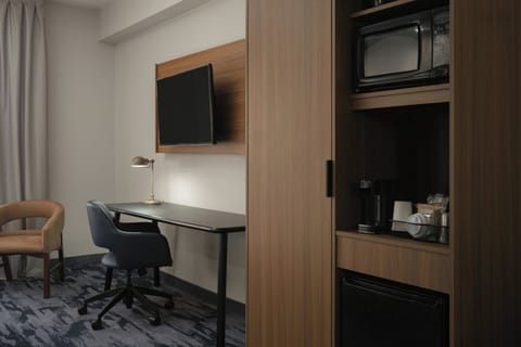 Pillowtop beds, desk, blackout drapes, iron/ironing board