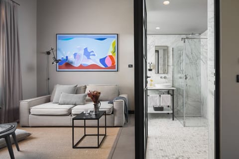 Deluxe Room, 1 King Bed with Sofa bed, Mezzanine | Living area | 65-inch Smart TV with satellite channels, TV, Netflix