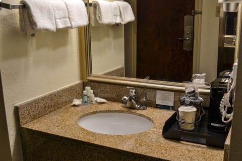 Bathtub, hair dryer, towels