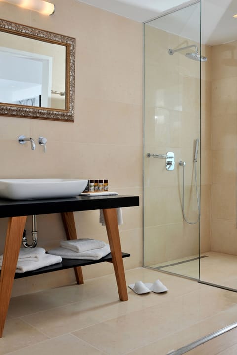 Shower, rainfall showerhead, designer toiletries, hair dryer