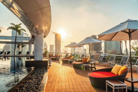 Outdoor pool, pool umbrellas, sun loungers