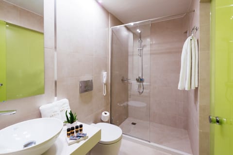 Double Room, Partial Sea View | Bathroom | Free toiletries, hair dryer, slippers, towels