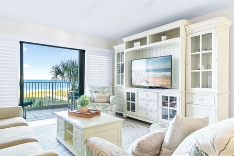 Direct Oceanfront Two-Bedroom Condo - Unit 308 | Living area | 50-inch flat-screen TV with cable channels, TV