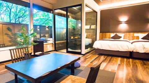 Modern Western Suite Japanese Western Room with Open-air Bath, Smoking | Premium bedding, in-room safe, desk, iron/ironing board