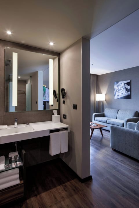 Junior Suite, 1 Bedroom, Bathtub | In-room safe, desk, laptop workspace, soundproofing