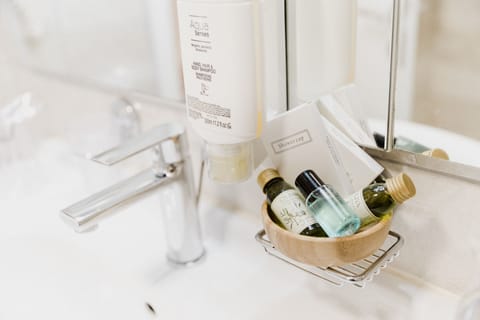 Double Room, Ground Floor | Bathroom | Hair dryer, slippers, towels, soap