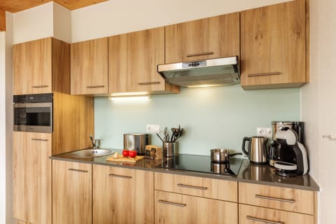 Deluxe cottage, 2 bedrooms | Private kitchen | Fridge, microwave, stovetop, dishwasher