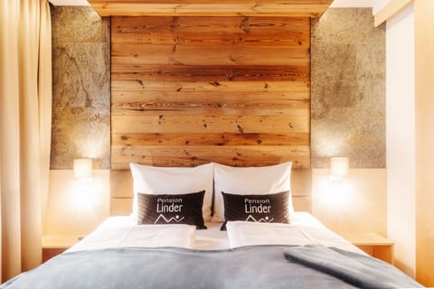 Deluxe Suite, 2 Bedrooms, Courtyard View, Courtyard Area | Down comforters, in-room safe, individually decorated, desk