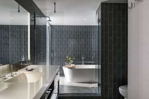 Designer toiletries, hair dryer, bathrobes, towels