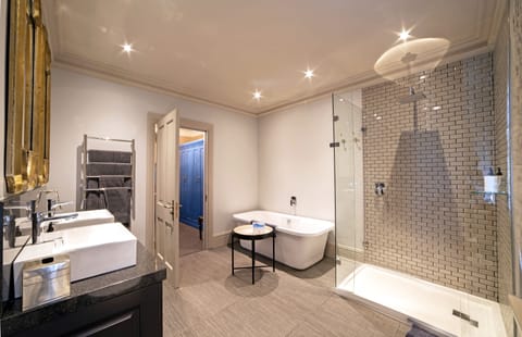 Designer toiletries, hair dryer, towels