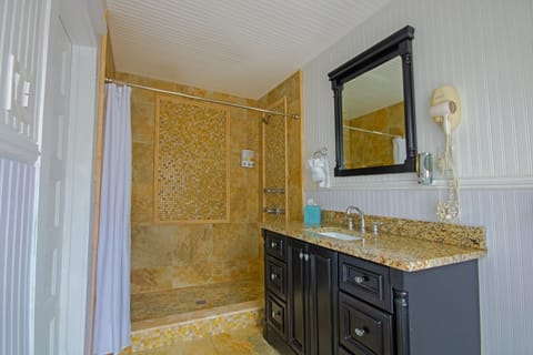 Deluxe Room, 2 Double Beds | Bathroom | Separate tub and shower, jetted tub, hair dryer, soap