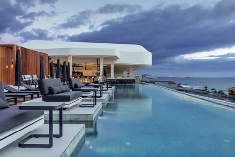 2 outdoor pools, pool umbrellas, sun loungers