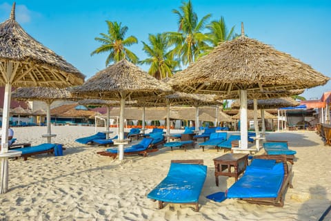 Private beach, white sand, sun loungers, beach umbrellas