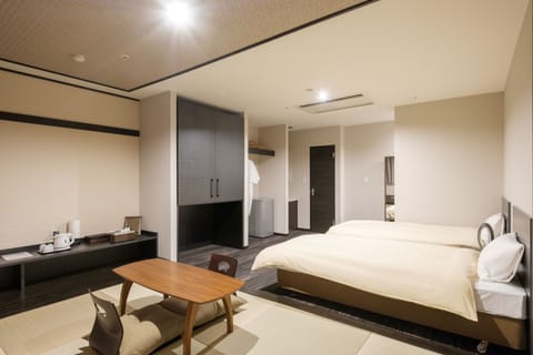 Western Style Executive Room | Blackout drapes, iron/ironing board (on request), WiFi (free)