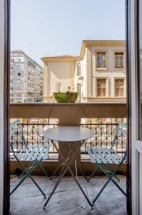 Family Room, 1 Queen Bed, City View | Terrace/patio