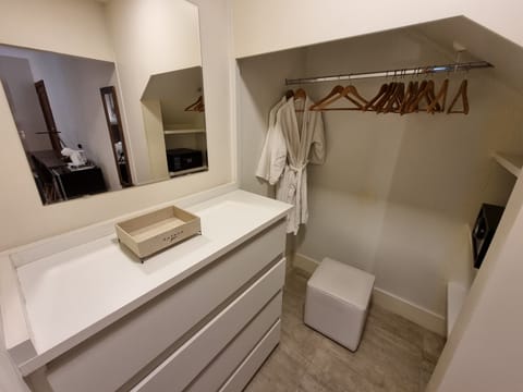 Luxury Double Room, Lanai, Garden View | Minibar, in-room safe, individually decorated, desk